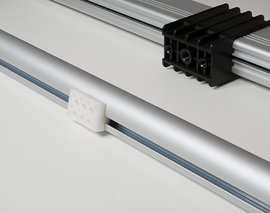 Track linear actuators are rodless